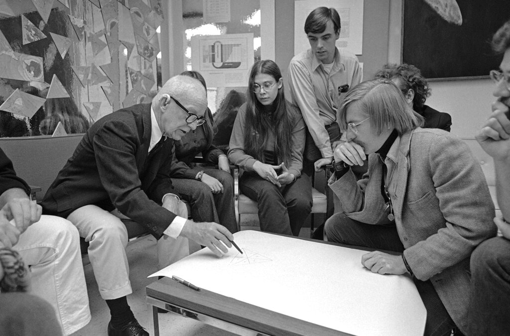 R. Buckminster Fuller, left, with students in Carbondale in 1971. Then a professor at Southern Illinois University, his office was just off campus. A new biography reports 