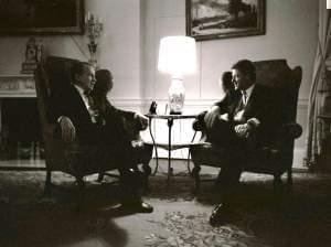 Former President Richard Nixon visits with President Bill Clinton in the family quarters of the White House