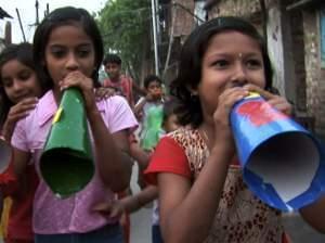 Child activists in Calcutta spreading health messages with megaphones.