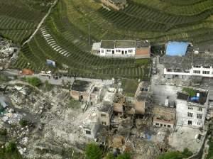 This aerial photo released by China's Xinhua news agency shows destroyed houses after a powerful earthquake hit Taiping town of Lushan County in Ya'an City, southwest China's Sichuan Province, Saturday, April 20, 2013. The powerful ear