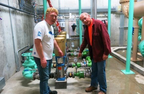 Staunton, Ill., Mayor Craig Neuhaus (left) checks out the town’s new water plant with Hank Fey, a public works director. 