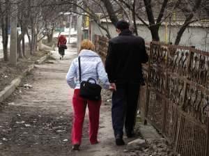 Oxana and Pavel Rucsineanu walk to the tuberculosis hospital