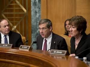  Sen. Mark Kirk, R-Ill., center, flanked by Sen. Susan Collins, R-Maine, right, and Sen. Richard Shelby, R-Ala.