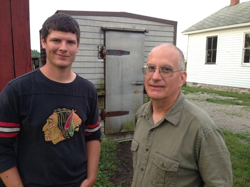 Marty Travis, right, started the Stewards of the Land food hub in 2005. His son Will, left, helps him transport food from local farms to area restaurants. 