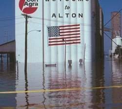 Flood waters surround a grain elevator in Alton, Illinois.