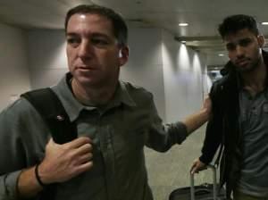 Glenn Greenwald and David Miranda 