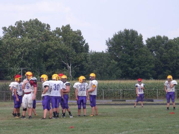 The Monticello High School football team practices in pre-season training in August. 
