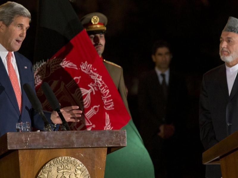 John Kerry and Hamid Karzai