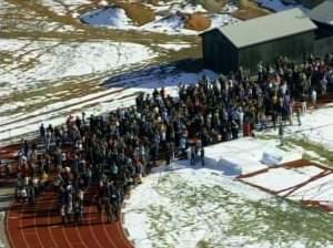 In this frame grab taken from video by KCNC television news in Denver, students of Arapahoe High School in Centennial, Colo., gather at a running track on Friday after a shooting at the school. Two students were injured in the shooting incident befor