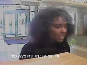 Surveillance footage of a suspect of a bank hold up on Friday, Dec. 27, 2013 at Heartland Bank on Philo Road in Urbana.