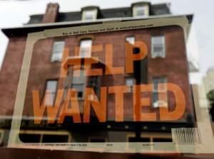 Sign of the times? A "help wanted" sign in the window of a Philadelphia business last year.