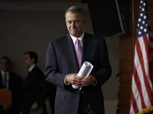 House Speaker John Boehner of Ohio arrives for a news conference on Capitol Hill in Washington, on Thursday.