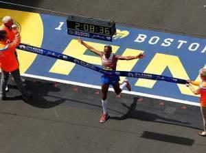 American Meb Keflezighi crosses the finish line, winning the Boston Marathon