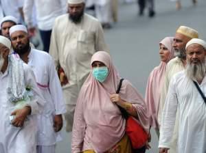 A Muslim pilgrim wears a mask in Mecca to protect against the Middle East Respiratory Syndrome in October 2013.