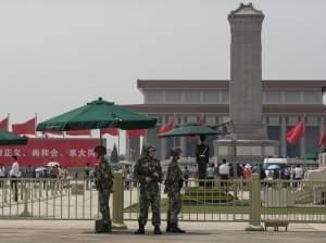 Chinese paramilitary police stand guard in Tiananmen Square in Beijing on June 4, the 25th anniversary of a violent crackdown on protesters by Chinese troops.