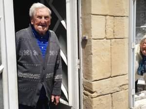 Lucien (left) and Germaine Rigault lean out of their home in La Cambe, a tiny village in Normandy a short distance from Omaha Beach. The couple, in their 80s, were in La Cambe during the Allied landing on June 6, 1944, and live there still. "We 