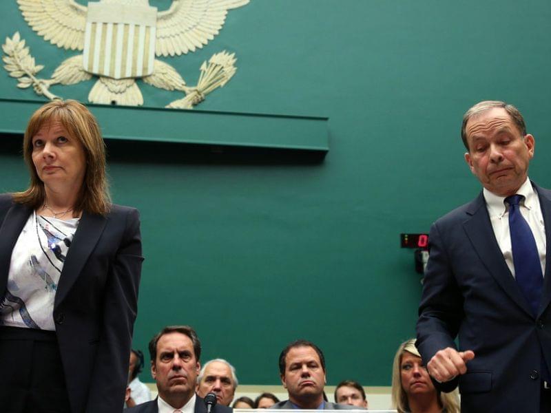 GM CEO Mary Barra and Anton Valukas, head of GM's internal recall investigation, stand at the witness table during a House Energy and Commerce Committee hearing on Capitol Hill Wednesday.