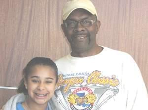 Claire, a student at Edison Middle School, poses with her uncle