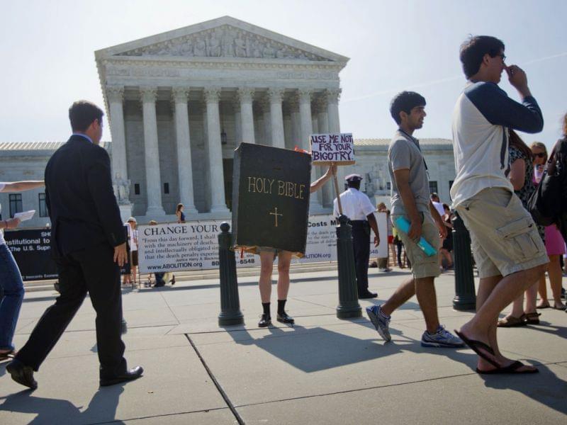 Demonstrator outside the Supreme Court building in Washington, D.C.