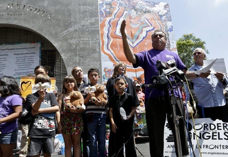 An activist speaks during a rally for immigrant rights in San Diego.