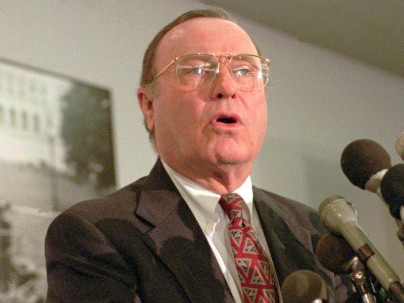 In a June 30, 1995 file photo, Alan Dixon meets reporters on Capitol Hill.