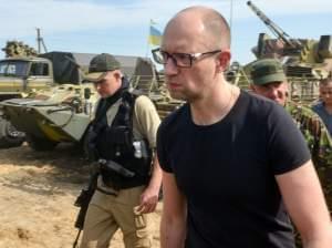 Ukrainian Prime Minister Arseniy Yatsenyuk visits forces stationed near the small city of Izyum on Wednesday.