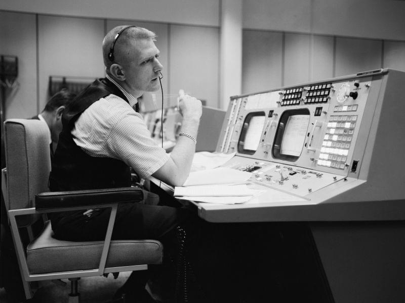 NASA flight director Eugene F. Kranz at his console in Mission Control in Houston on May 30, 1965, during a Gemini-Titan IV simulation to prepare for the four-day, 62-orbit flight.