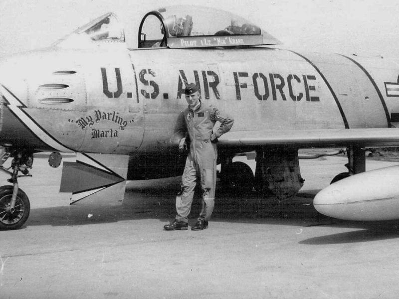 Kranz poses in front of the F-86 Sabre he flew as part of the U.S. Air Force 69th Fighter Bomber Squadron in Korea. He named his plane