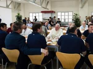 In this photo provided by the Vatican newspaper L'Osservatore Romano, Pope Francis has lunch at the Vatican workers' cafeteria on Friday.