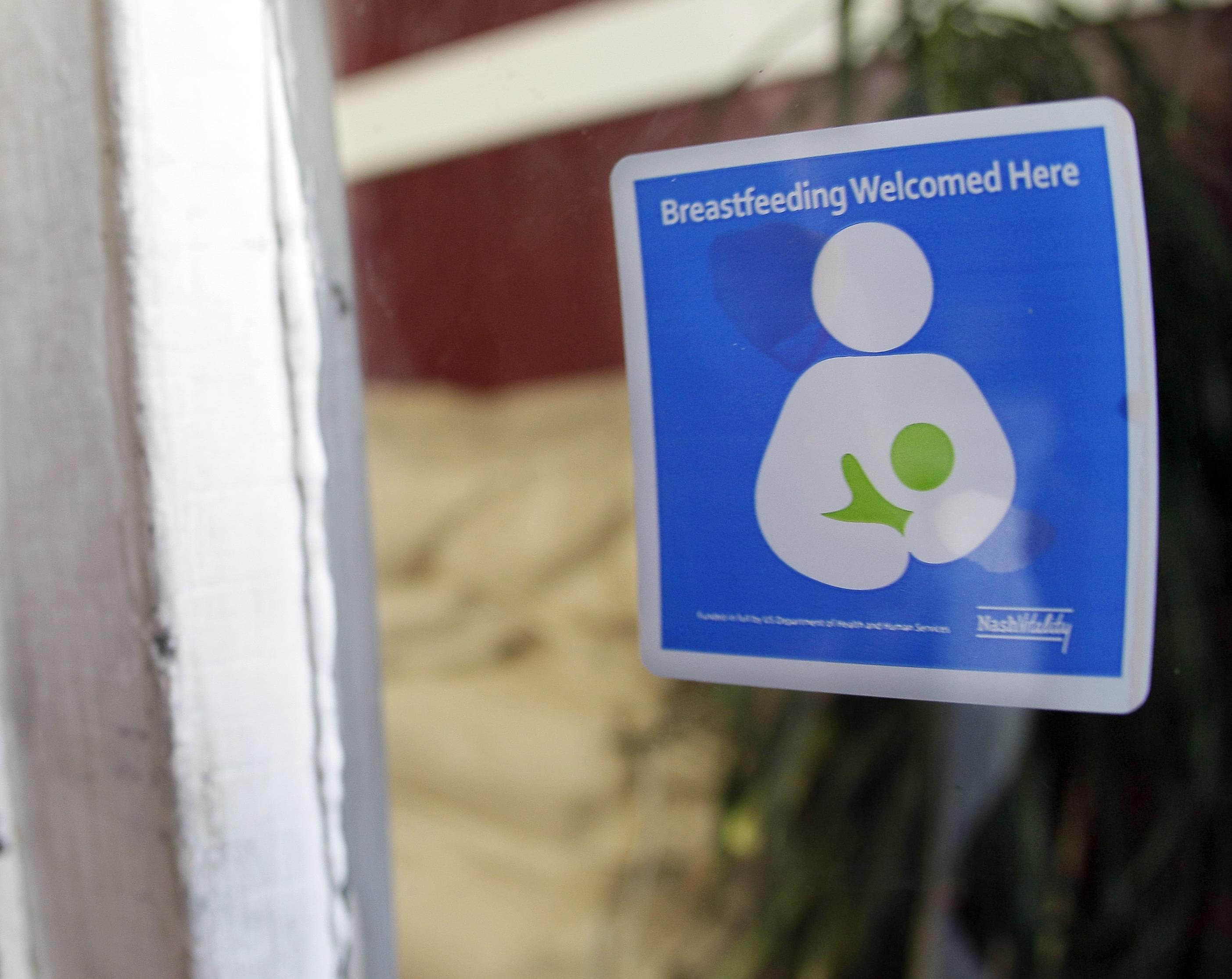 A decal reading "Breastfeeding Welcomed Here" is displayed on the door to a store on Thursday, Aug. 11, 2011, in Nashville, Tenn. Nashville&#039;s Metro Health Department is encouraging local businesses to make breastfeeding mothers fee