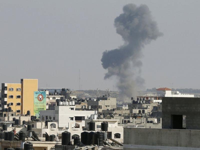 Smoke is seen after what witnesses call an Israeli airstrike in Gaza City.
