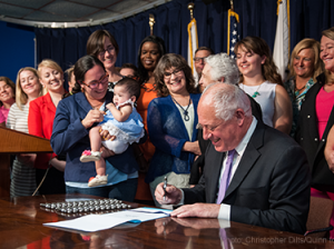 Governor Pat Quinn signs measure protecting pregnant women from losing their jobs.