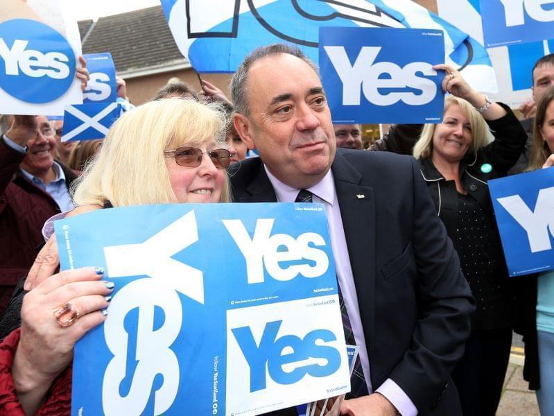 Scotland First Minister Alex Salmond poses for photos with Yes campaigners in Turriff, Scotland.