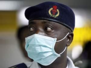 A Nigerian health official at Murtala Muhammed International Airport in Lagos, Nigeria on August 4th.