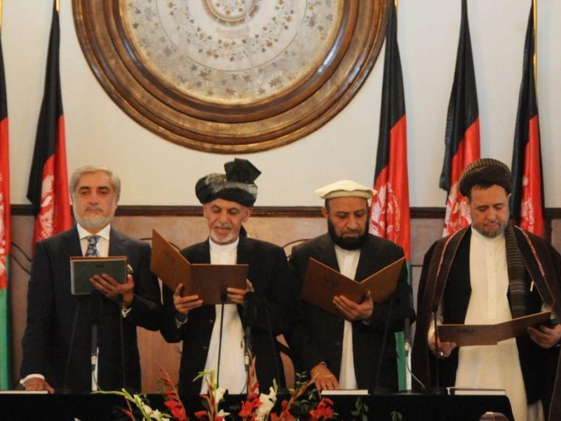 Ashraf Ghani Ahmadzai stands next to Afghanistan's Chief Executive Abdullah Abdullah and two deputy officials as he takes the oath during the inauguration ceremony in Kabul.