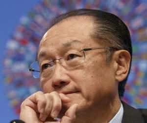 World Bank President Jim Yong Kim listens during a news conference at IMF Headquarters.