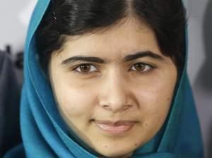 Malala Yousafzai poses for photos in New York.
