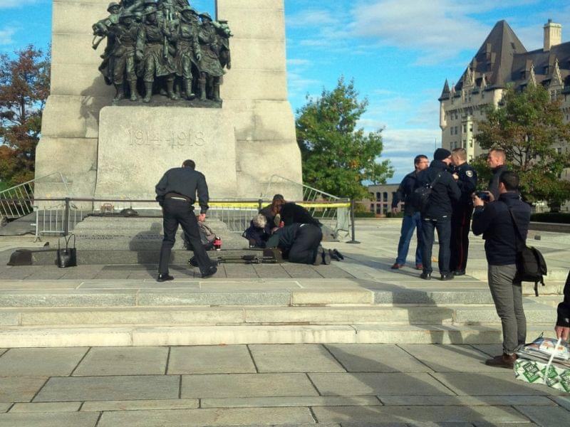 A Canadian soldier shot outside the war memorial in Ottawa is tended to Wednesday.