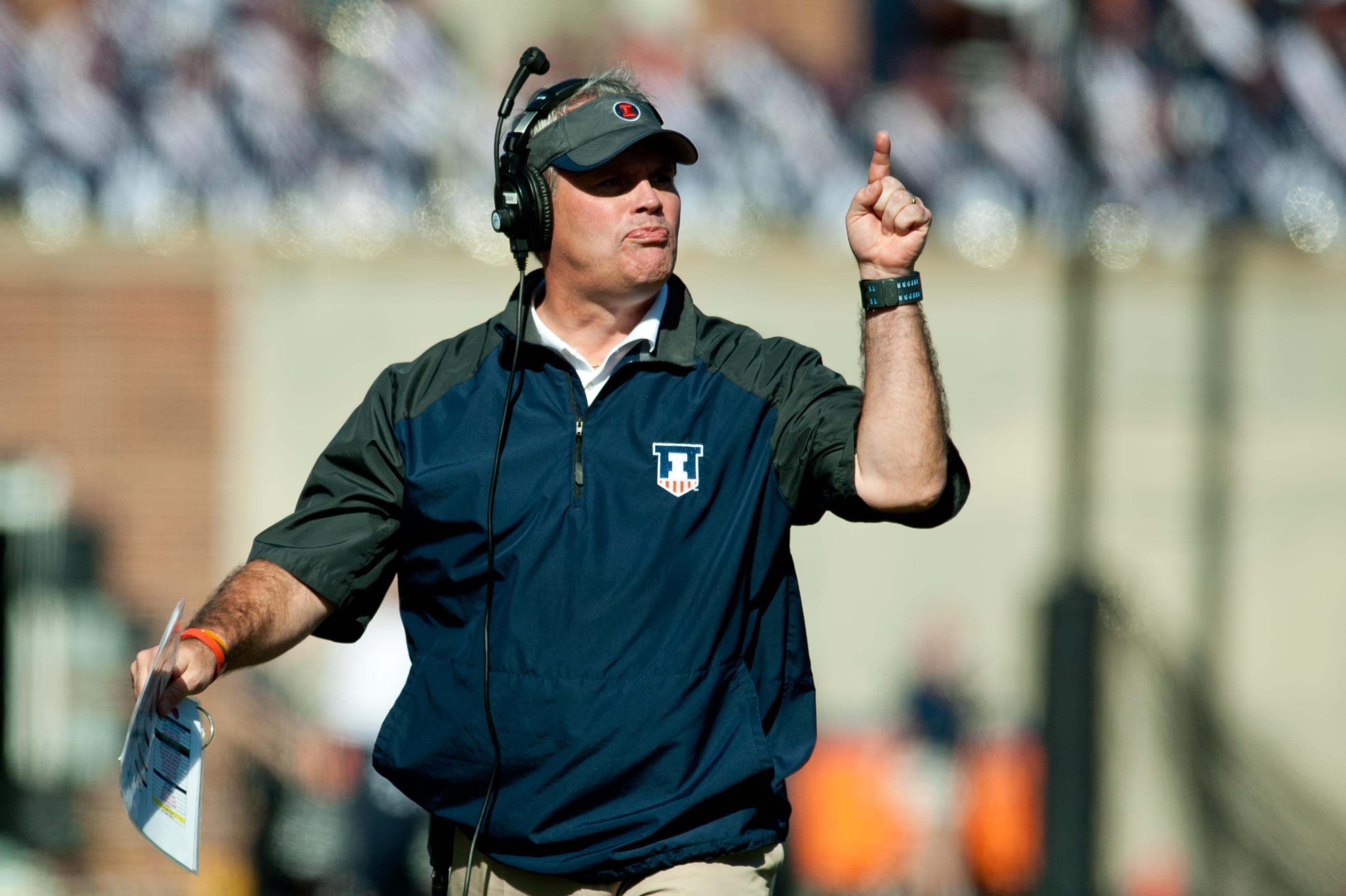Illinois head coach Tim Beckman shouts at the referees during Saturday's win over Minnesota at Memorial Stadium.