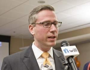 Democratic candidate for state treasurer Mike Frerichs talks to reporters on election night