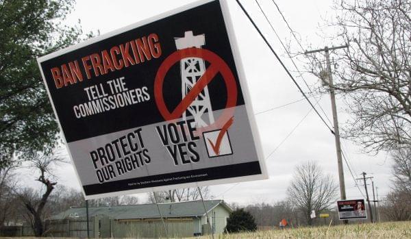 A sign near the Johnson County courthouse urges county voters to defeat a referendum on fracking.