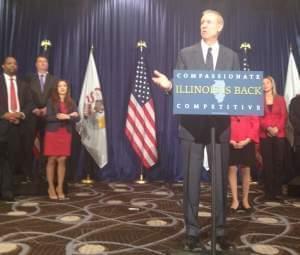 Governor Bruce Rauner introduces members of his "transition team" in Chicago.