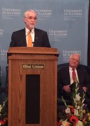 Incoming University of Illinois President Timothy Killeen addresses the Urbana campus at the Illini Union on Wednesday as outgoing President Bob Easter looks on.