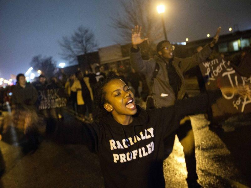 Brittany Ferrell chants while marching through the streets of St. Louis protesting the August shooting of Michael Brown.