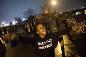 Brittany Ferrell chants while marching through the streets of St. Louis protesting the August shooting of Michael Brown.