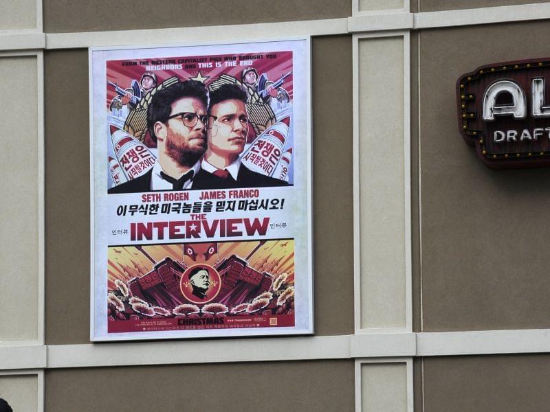 A poster advertising The Interview hangs on the back wall of the Alamo Drafthouse Cinema