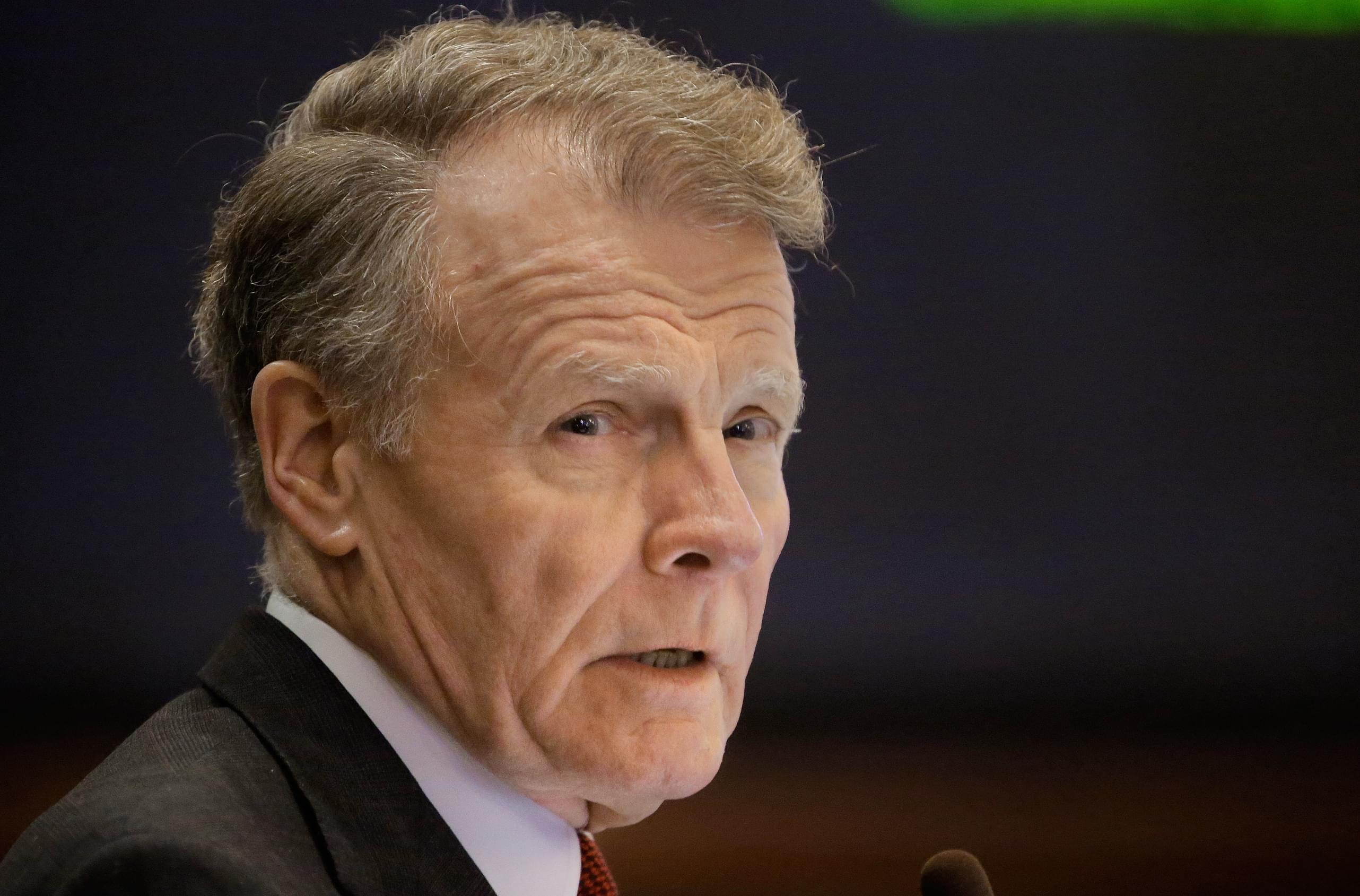 House Speaker Michael Madigan talks to lawmakers in Springfield December 3.