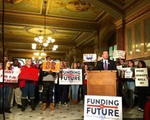 State Sen. Andy Manar (D-Bunker Hill) speaks to supporters of his school funding bill at a rally in the Capitol rotunda in December.