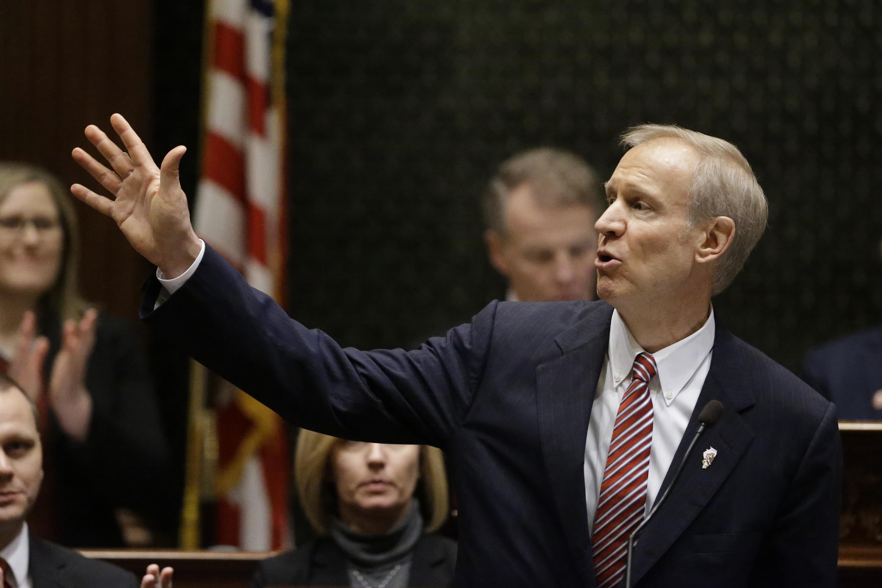 Illinois Gov. Bruce Rauner delivers his State of the State address to a joint session of the General Assembly, Wednesday, Feb. 4, 2015, at the Capitol in Springfield, Ill. 