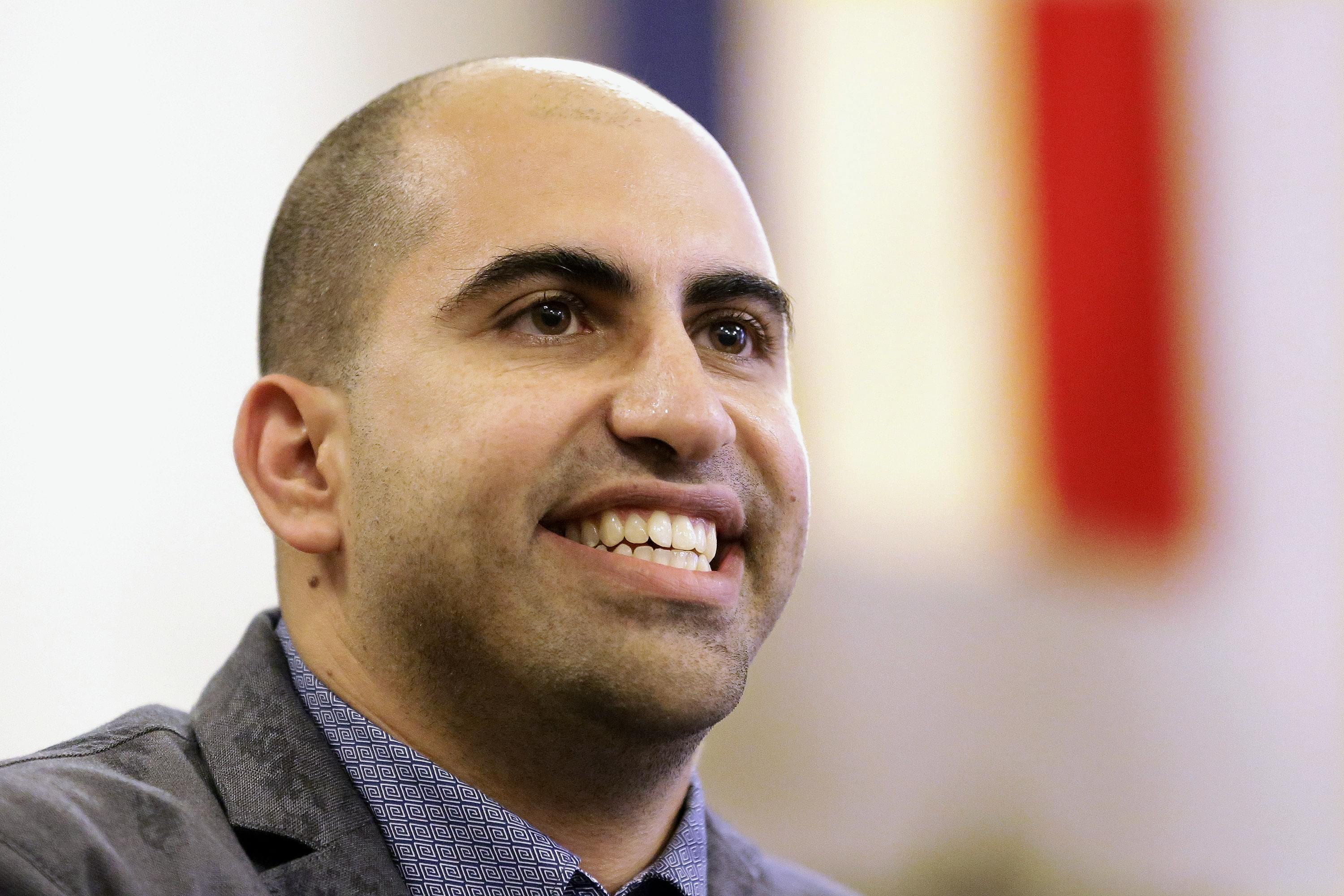 Steven Salaita speaks during a news conference in Champaign in September.